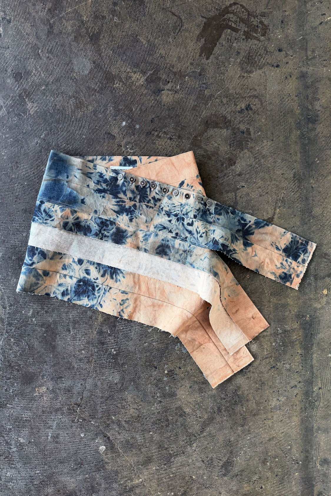 SHOHEI YURIE DENIM MINI SKIRT in persimmon-dyed denim